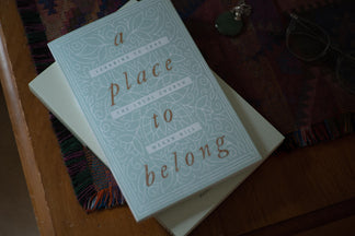 Book Review : A place to belong